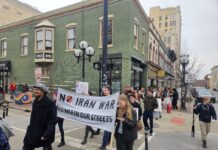 Ann Arbor Against ICE Holds First Protest March A2 Against Ice took Sunday's protest past Literati. Photo by Drew Saunders.