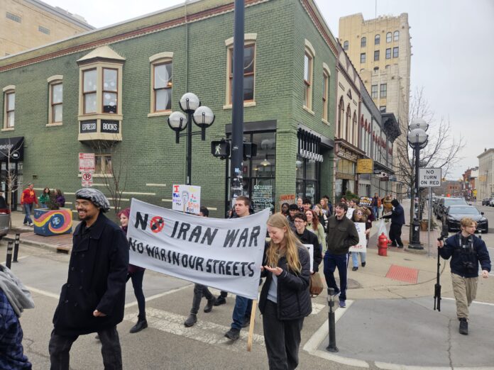 A2 Against Ice took Sunday's protest past Literati. Photo by Drew Saunders.