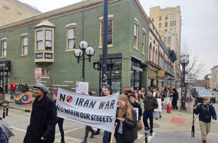 A2 Against Ice took Sunday's protest past Literati. Photo by Drew Saunders.