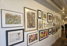 Paintings in the Michigan Watercolor Society Signature Show at the A2AC, at the opening on April 17. Photo by Drew Saunders.