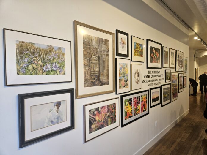 Paintings in the Michigan Watercolor Society Signature Show at the A2AC, at the opening on April 17. Photo by Drew Saunders.