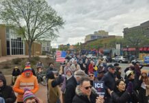 Crowd at the May Day resource rally held by A2 Indivisible. Photo by Drew Saunders.
