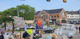 AA Indivisible's May 21 protest. Photo by Drew Saunders.