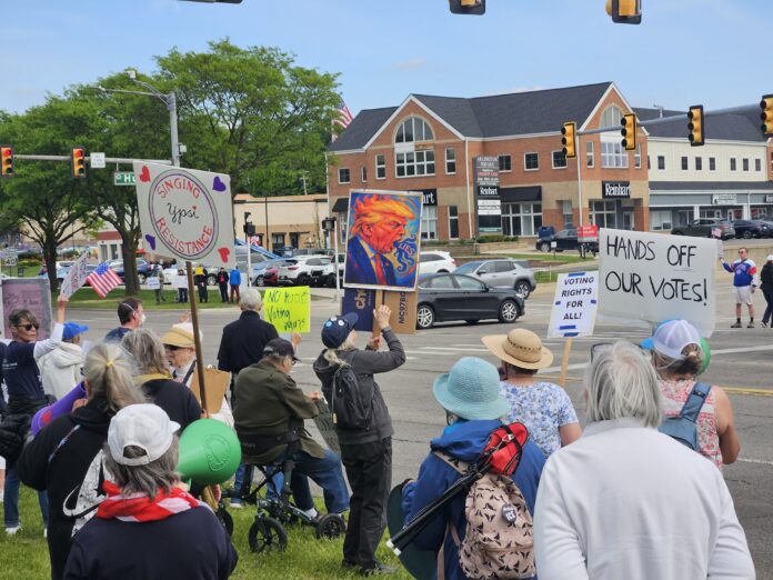 AA Indivisible's May 21 protest. Photo by Drew Saunders.
