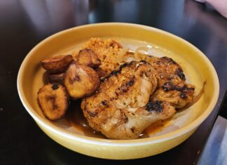 Galy’s Opens in Downtown Ypsilanti with West African Fusion Cuisine The chicken yassa at Galy's. Photo by Drew Saunders.