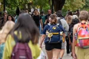 Students walking across the Diag.